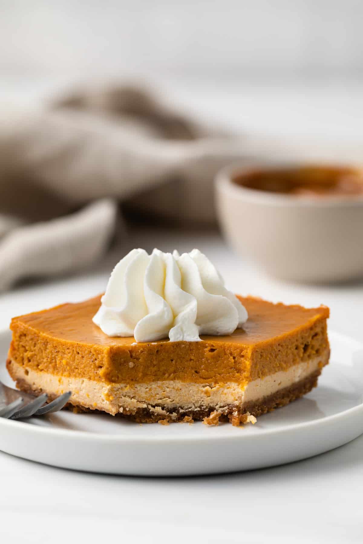 Dulce de Leche Pumpkin Bar on plate with bite taken out