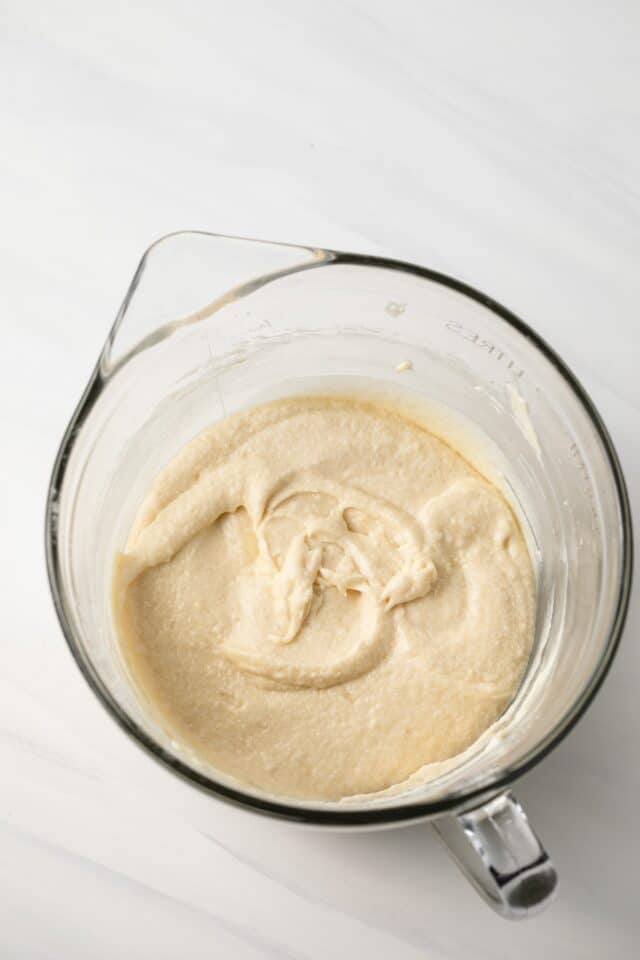 Cake batter in glass bowl.