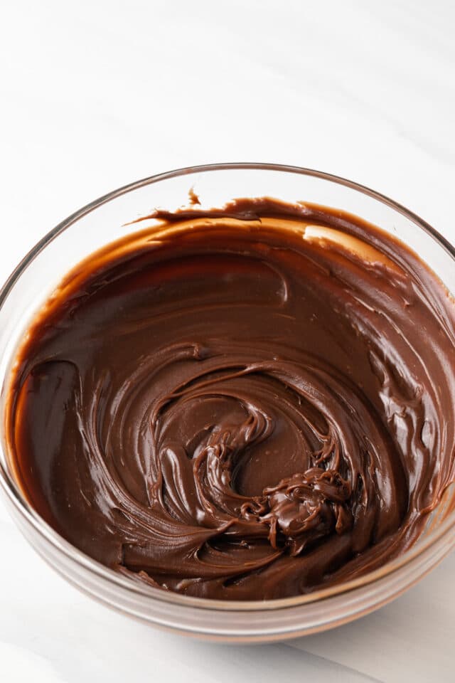 Chocolate ganache in glass bowl.