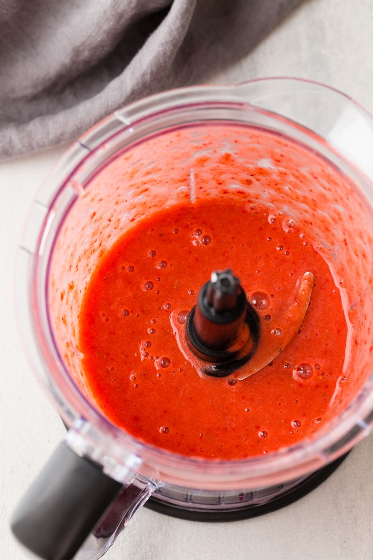 Strawberry puree in food processor.