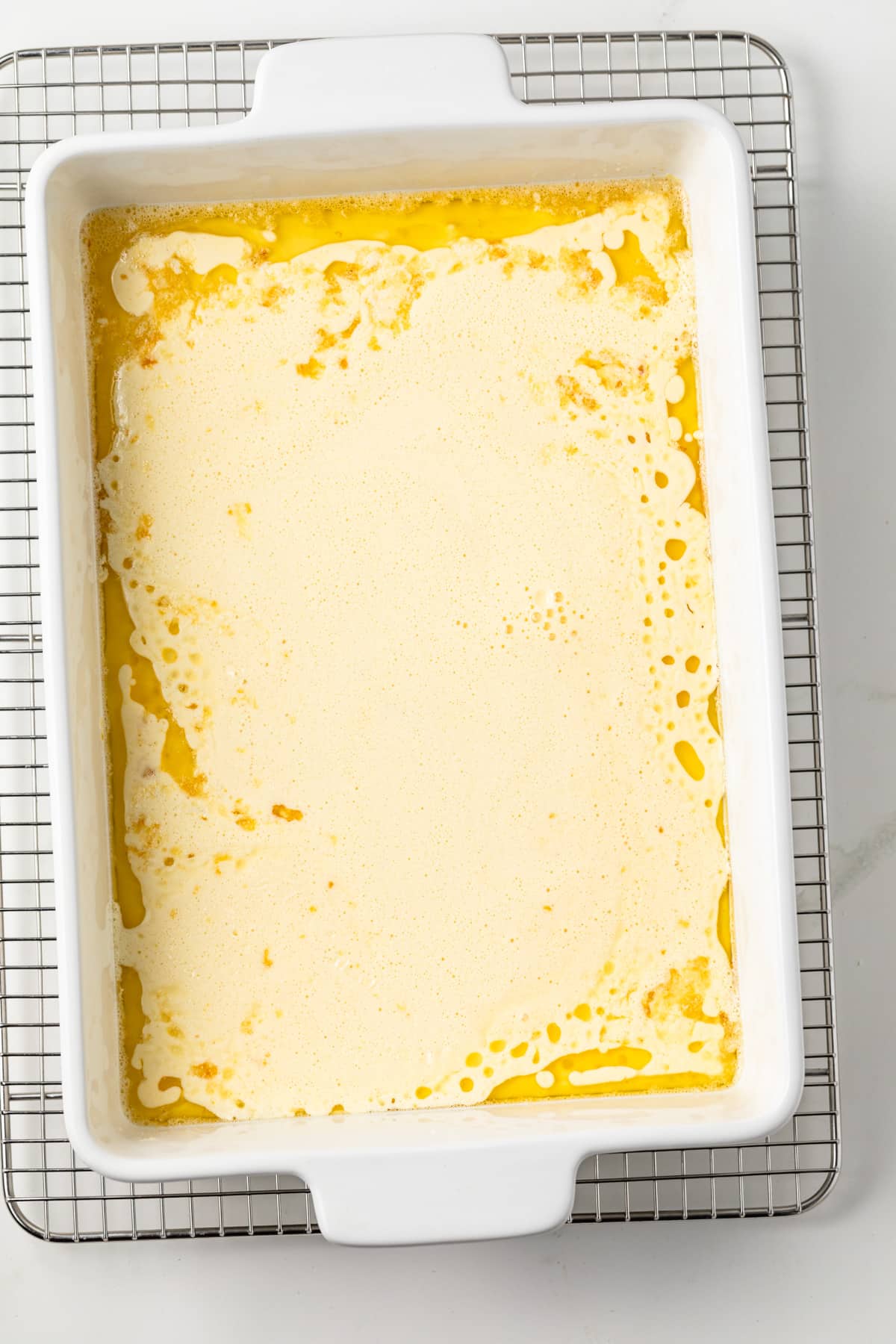 Pancake batter in baking pan.