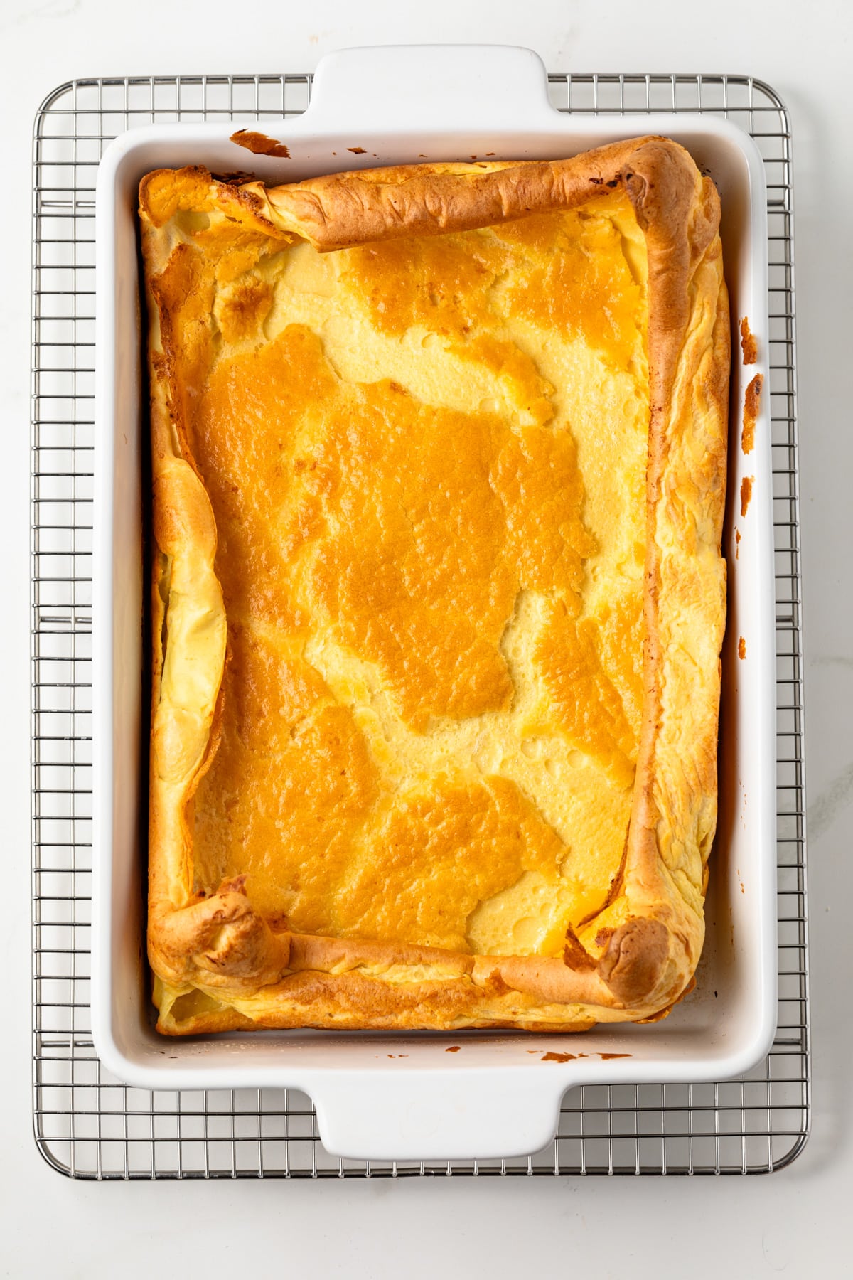 Baked German pancake in baking pan.