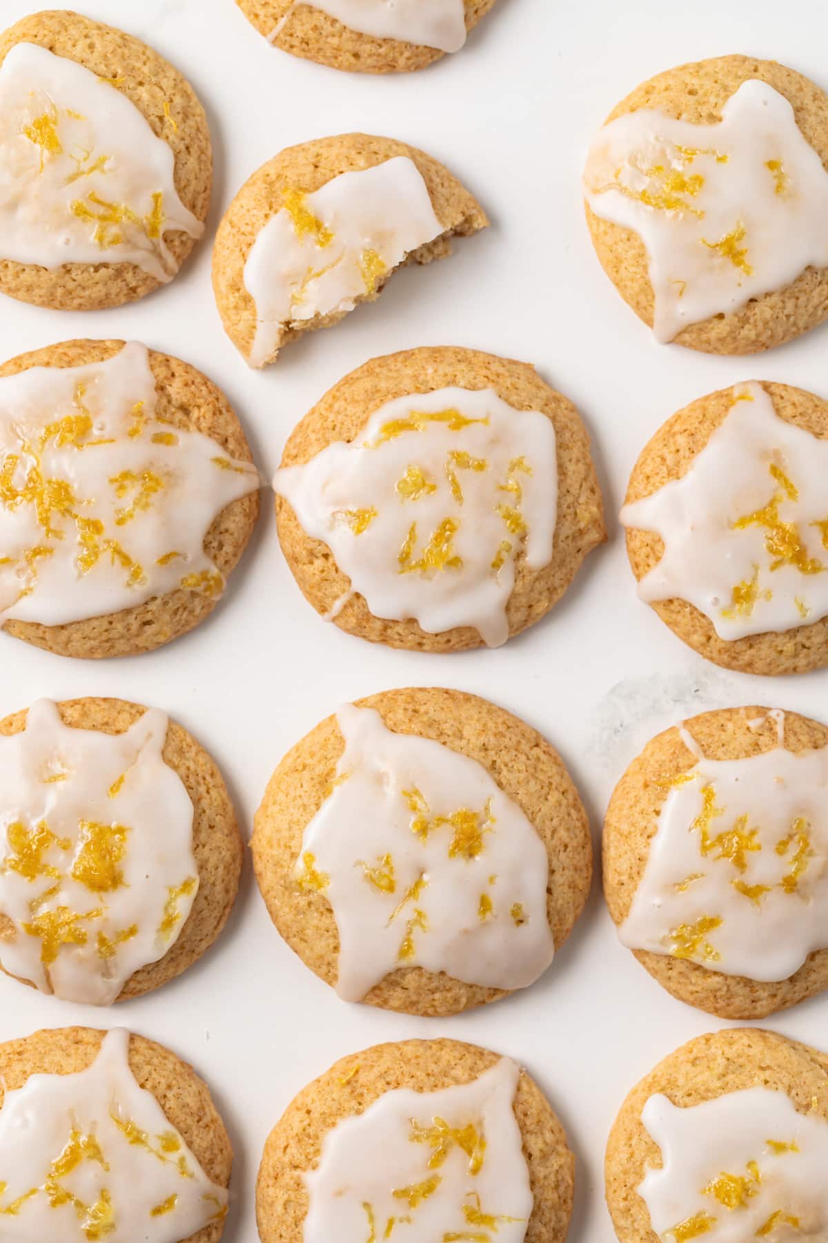 Overhead of glazed lemon cookies.