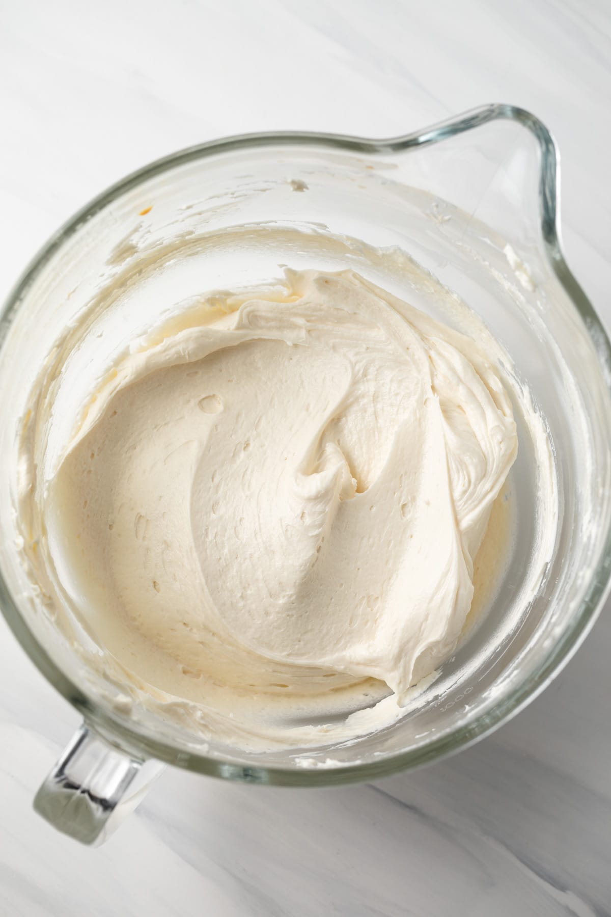 Irish cream frosting in glass bowl.