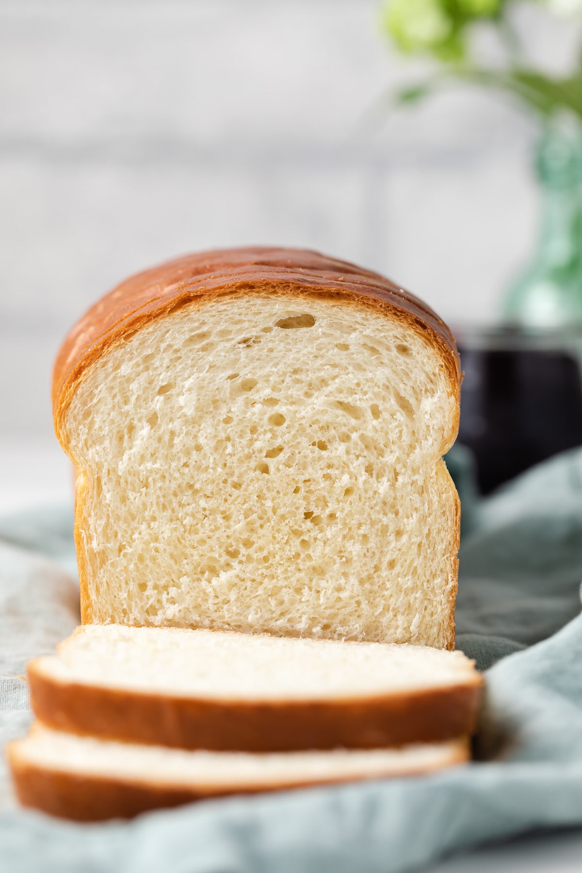 loaf of white bread with two slices cut