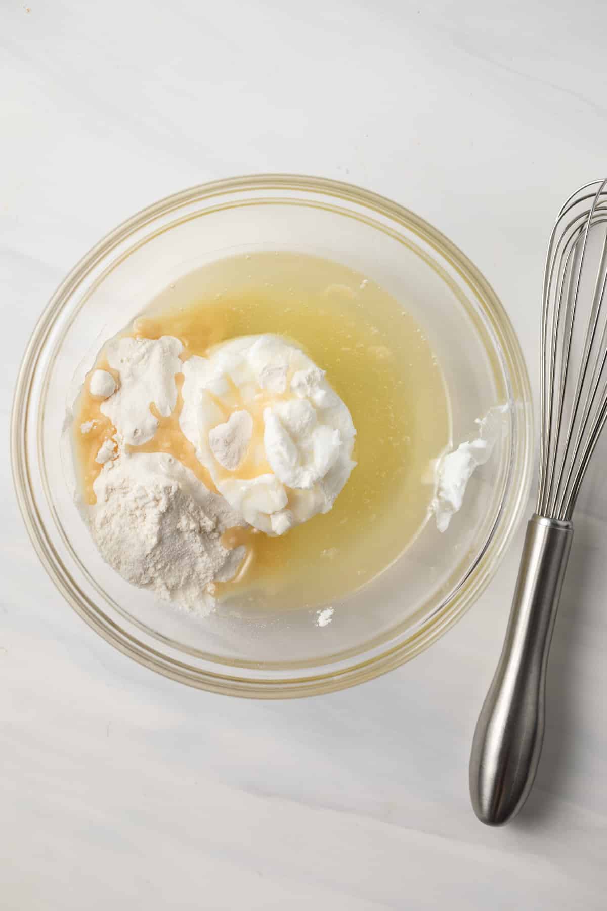 Flour, oil, and shortening in a bowl.