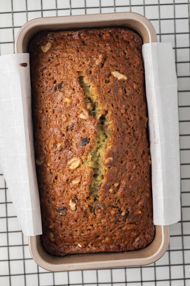Honey nut zucchini bread in a loaf pan.