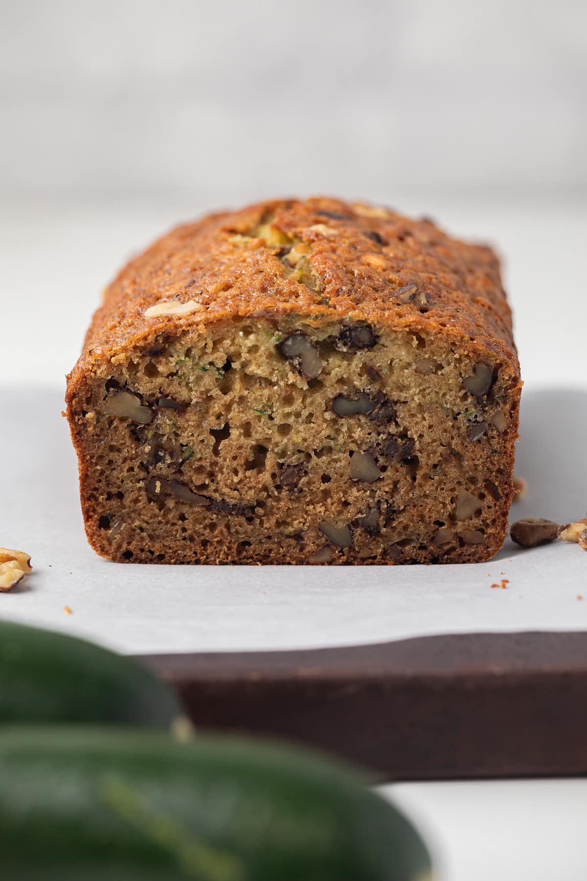 Front facing honey nut zucchini bread with slice taken out.