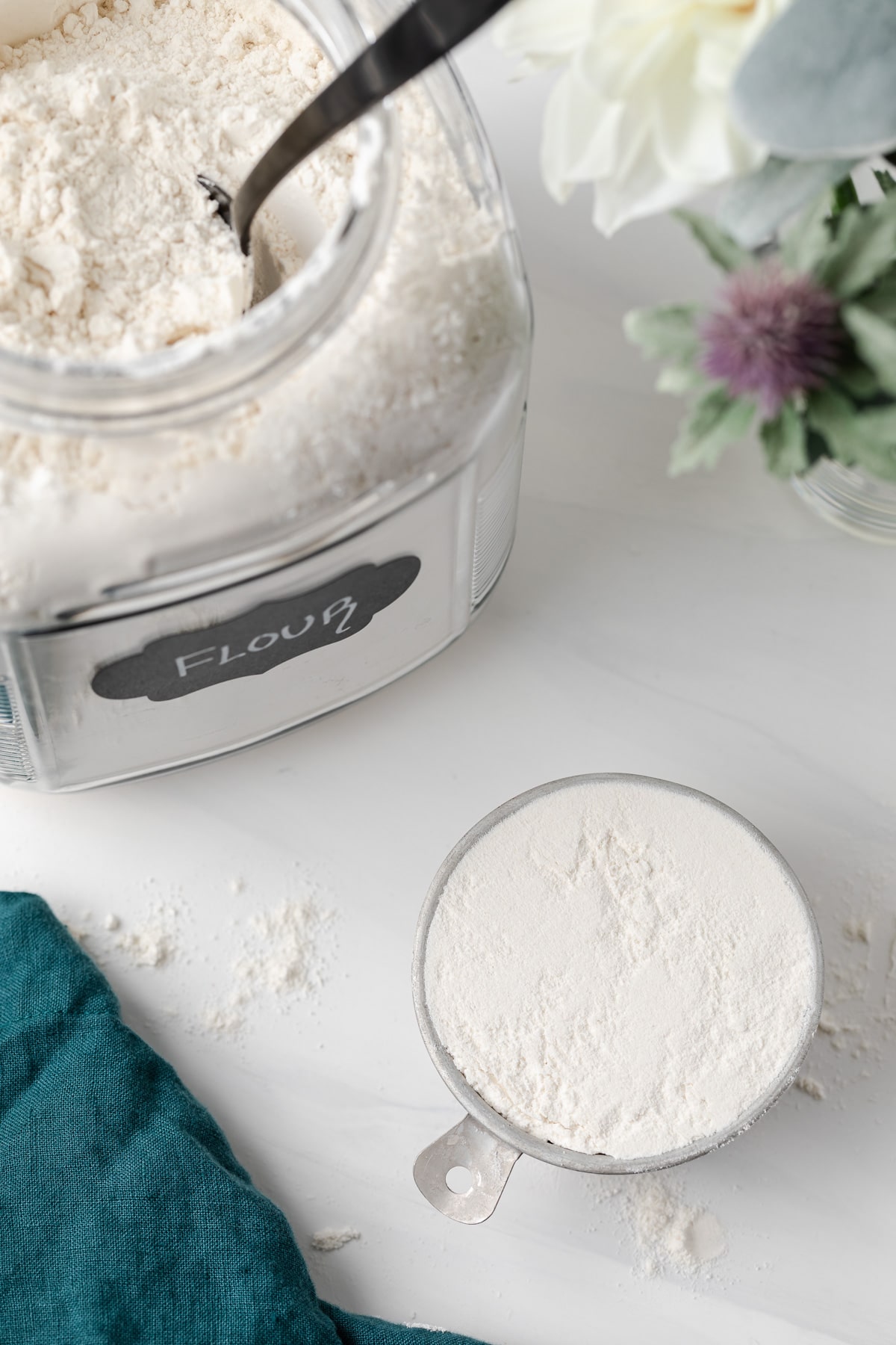 overhead of leveled measuring cup of flour