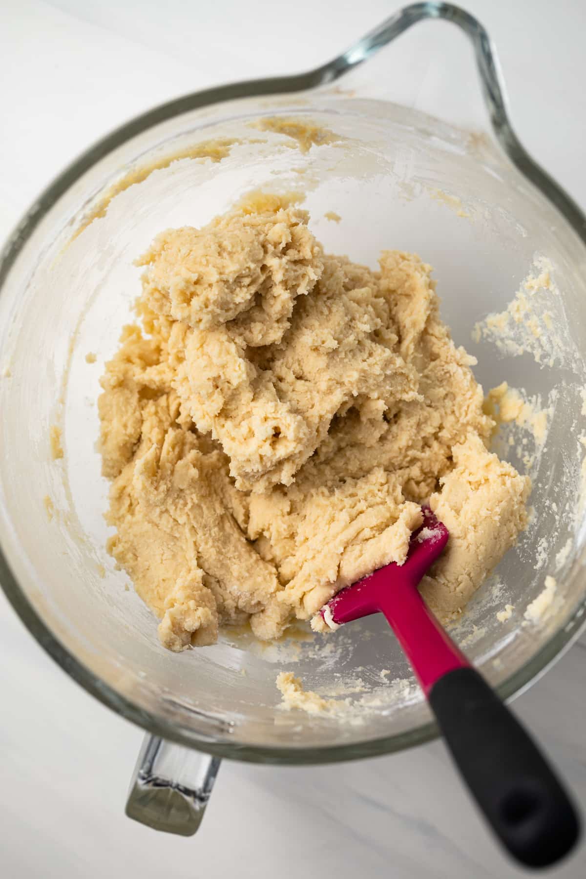 Cookie dough in a glass bowl.