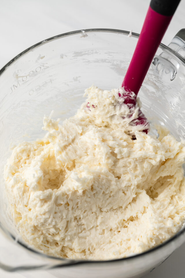 Coconut mixed into creamed sugar mixture.