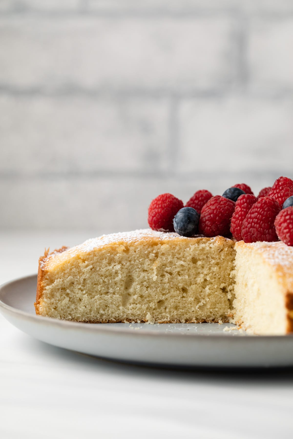 Side view of Irish tea cake with a slice take out.