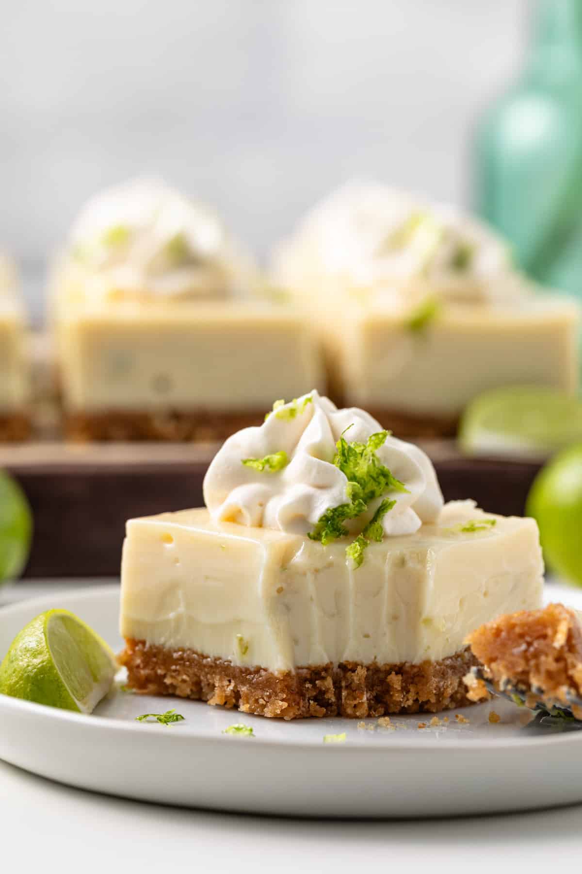 Key lime bar with bite taken out.