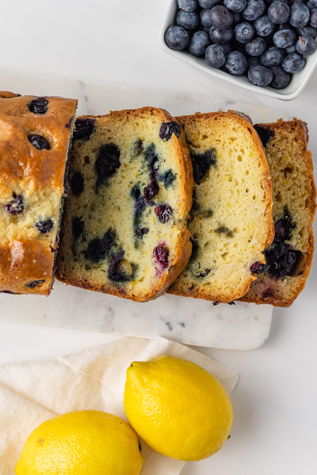 Overhead of sliced lemon blueberry bread.