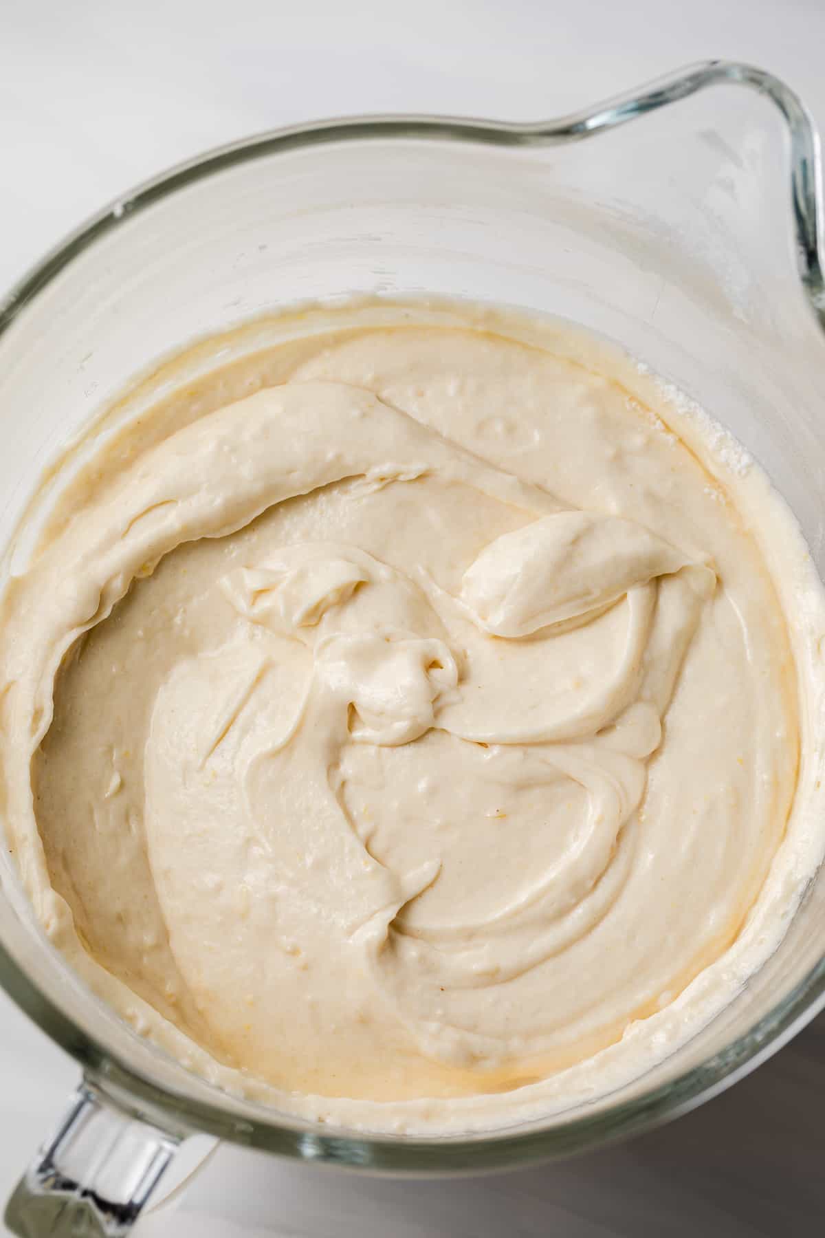 cake batter in a glass mixing bowl