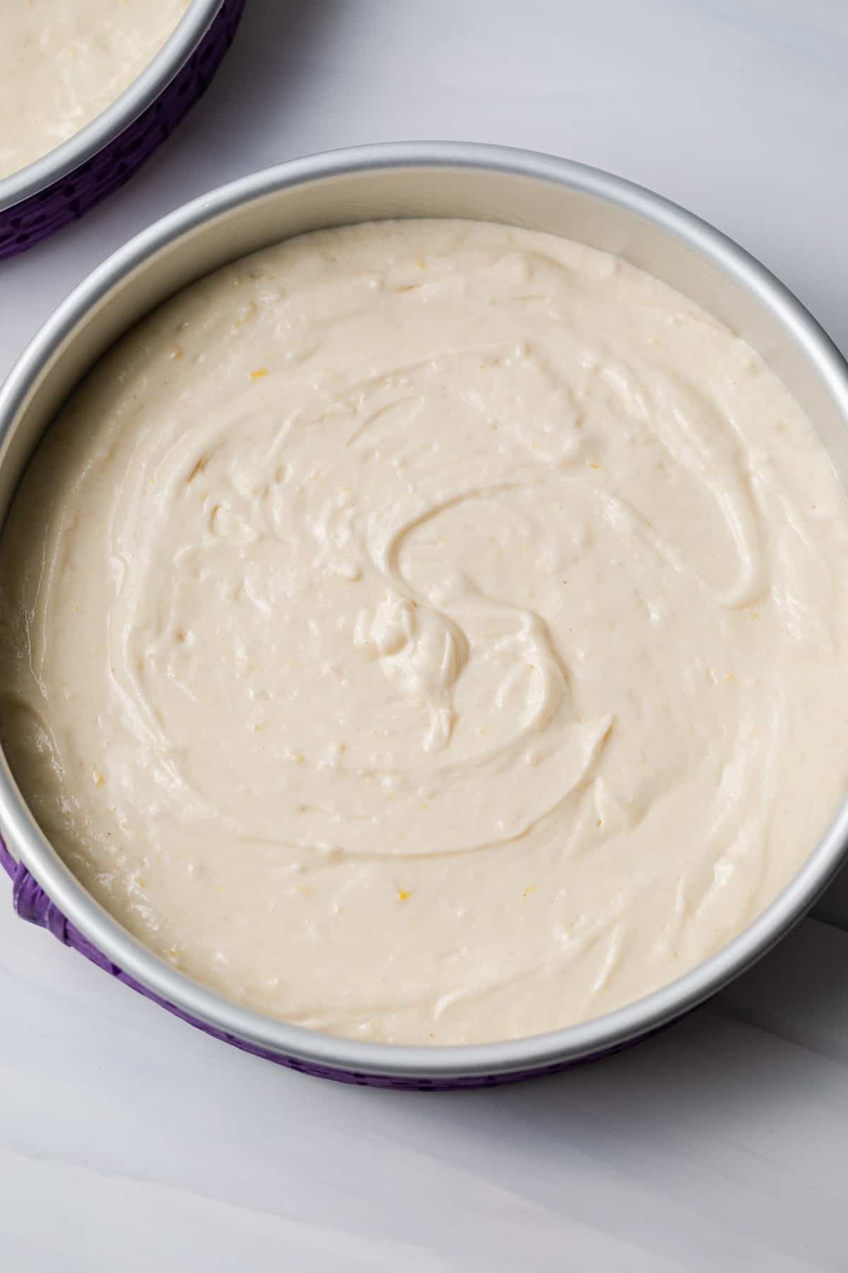 cake batter in a cake pan
