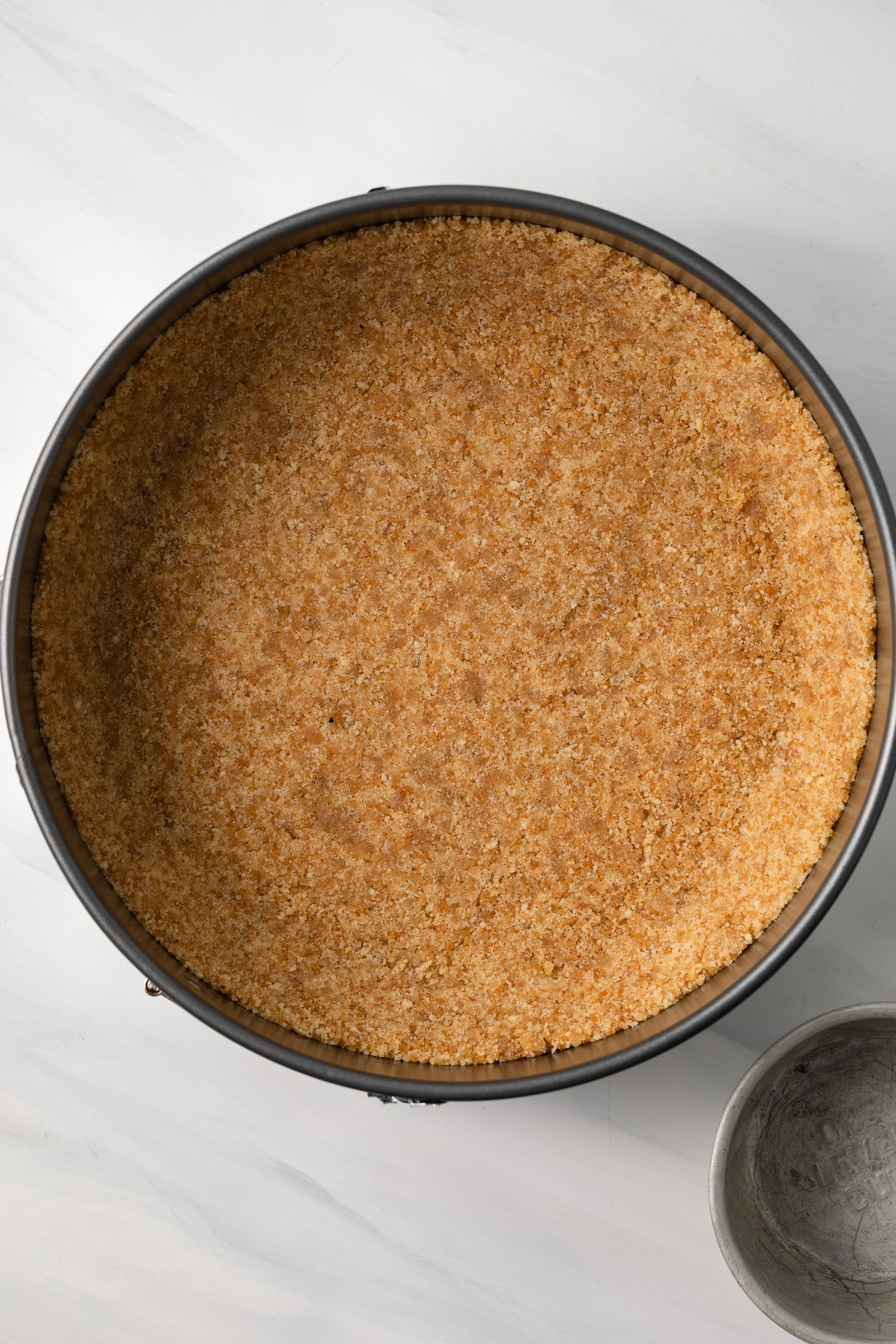 Vanilla wafer crust in pan.