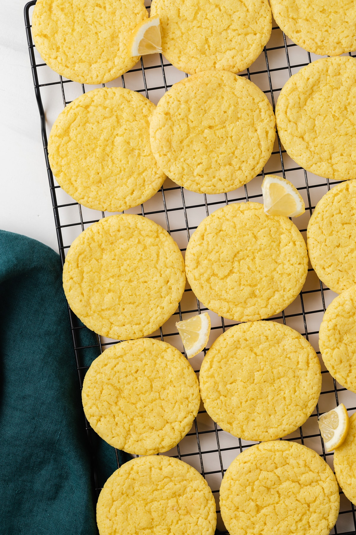 Lemon cookies on wire rack.