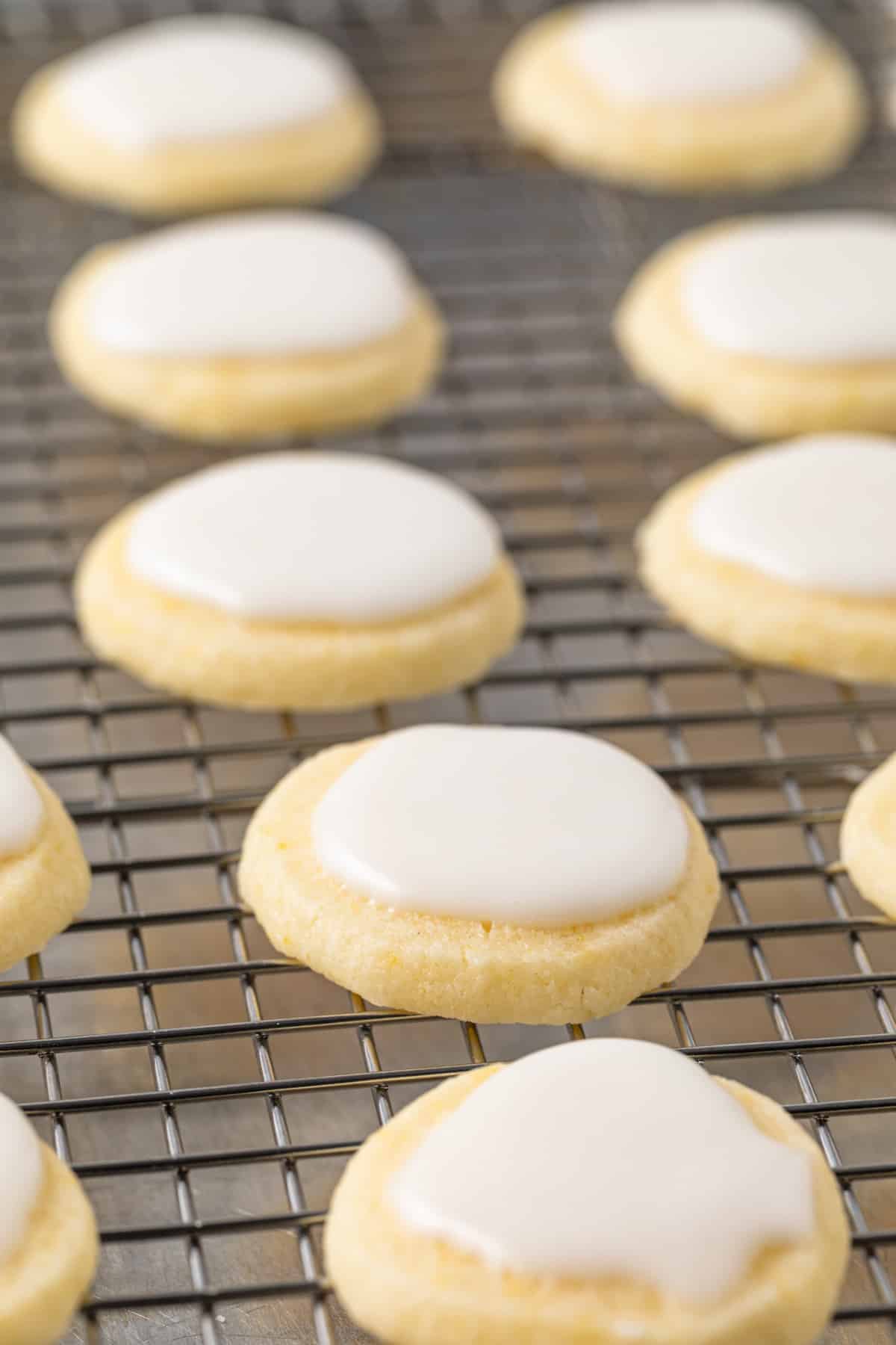 Side view of iced lemon cookies.