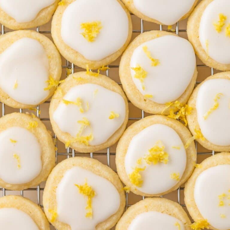 Overhead of lemon meltaway cookies on a cooling rack.