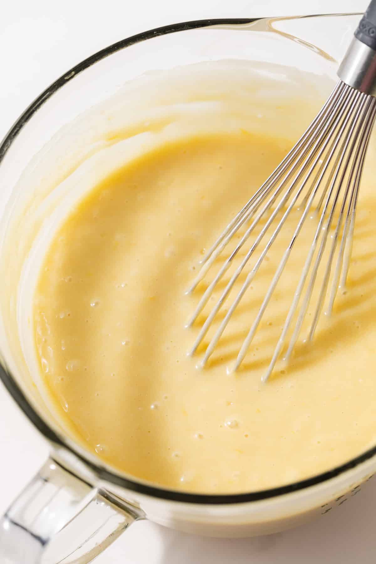 Cake batter in glass bowl.