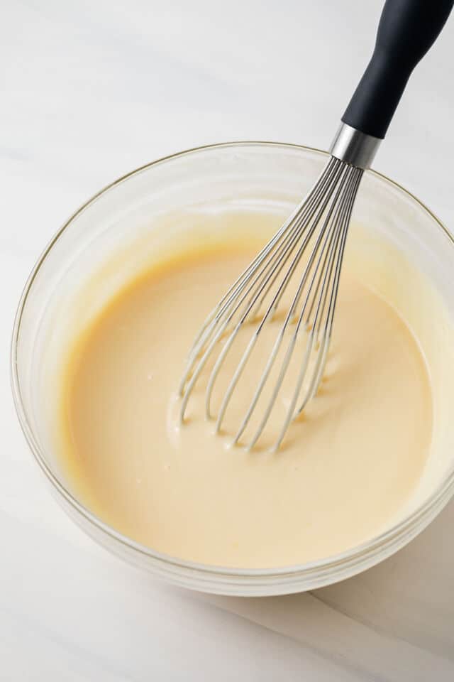 Lemon pie filling in glass bowl.