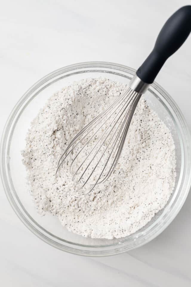 Dry ingredients mixed in glass bowl.