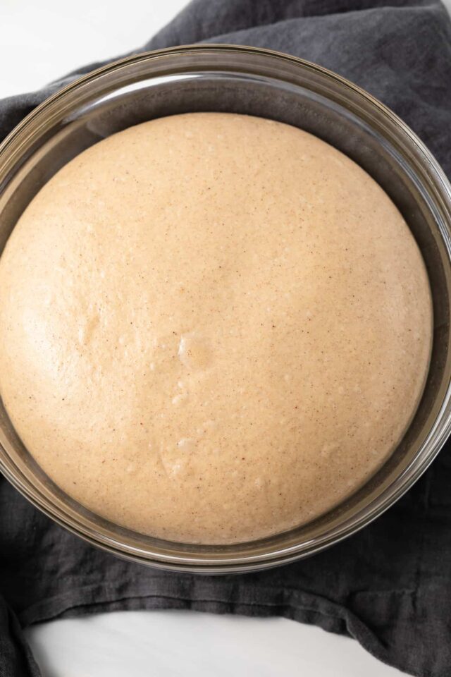 Maple Cinnamon Bagels dough in glass bowl
