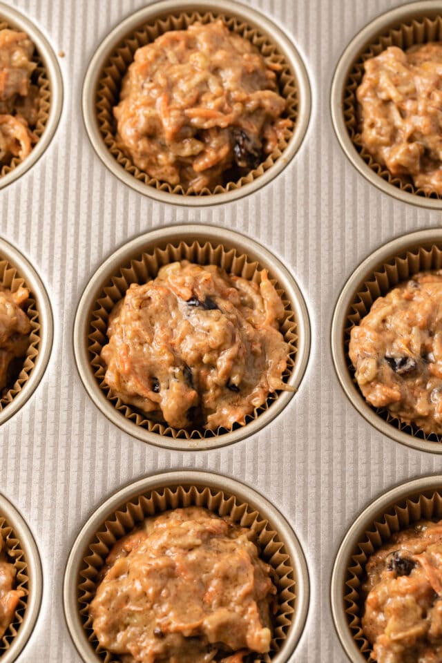 Muffin Batter in a muffin pan.