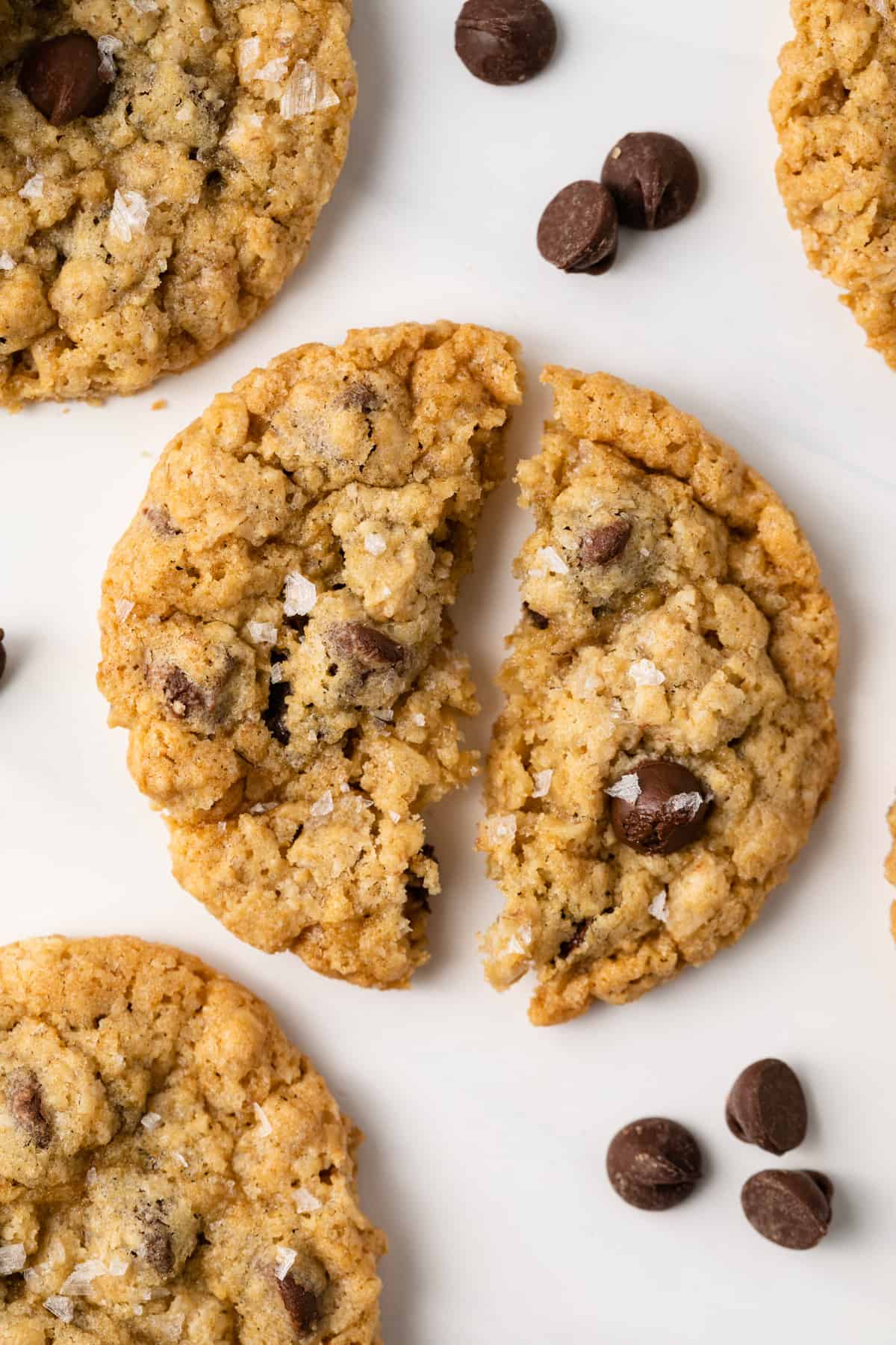 An oatmeal chocolate chip cookie cut in half