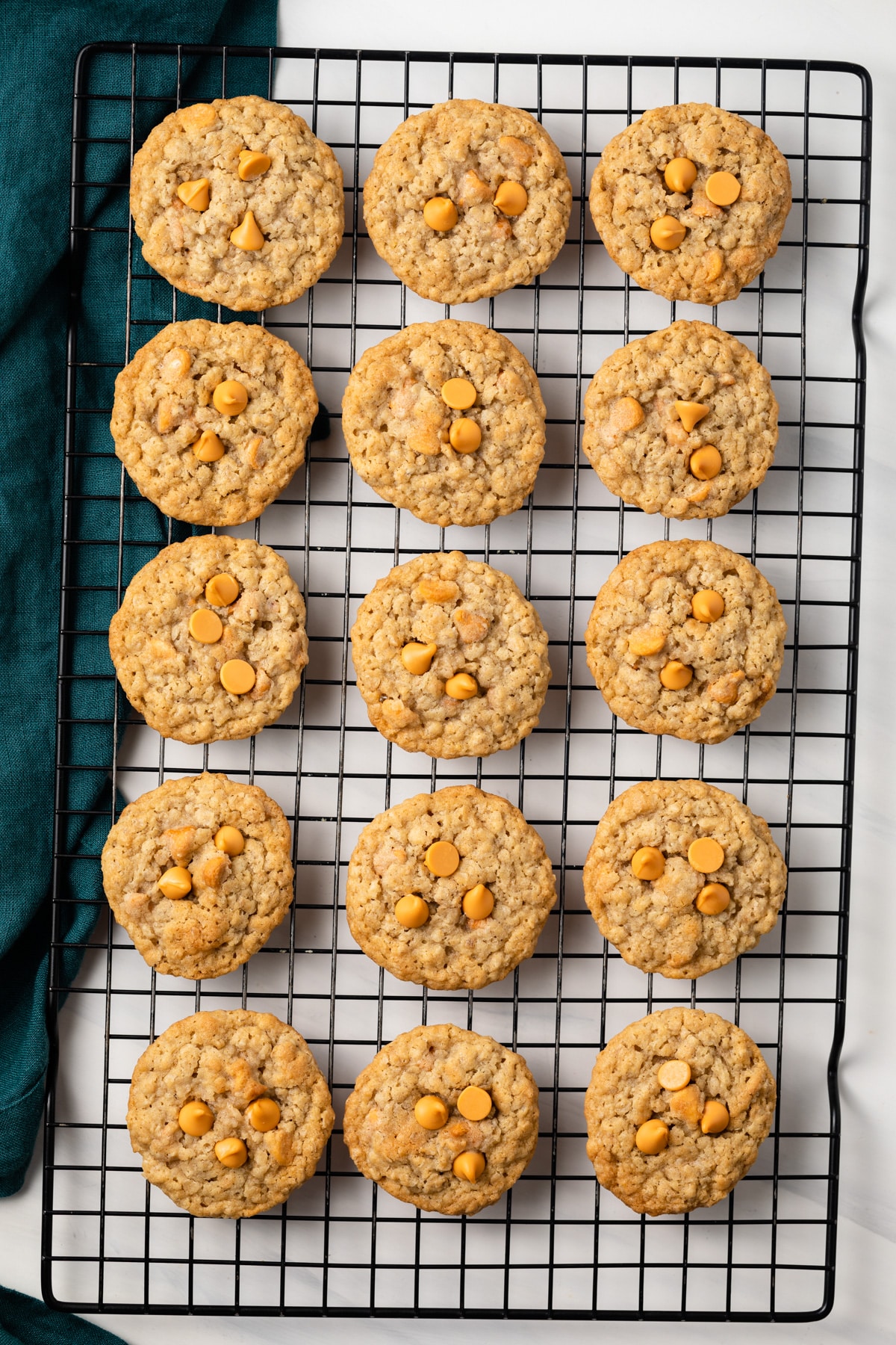 Overhead of oatmeal scotchies on wire rack.