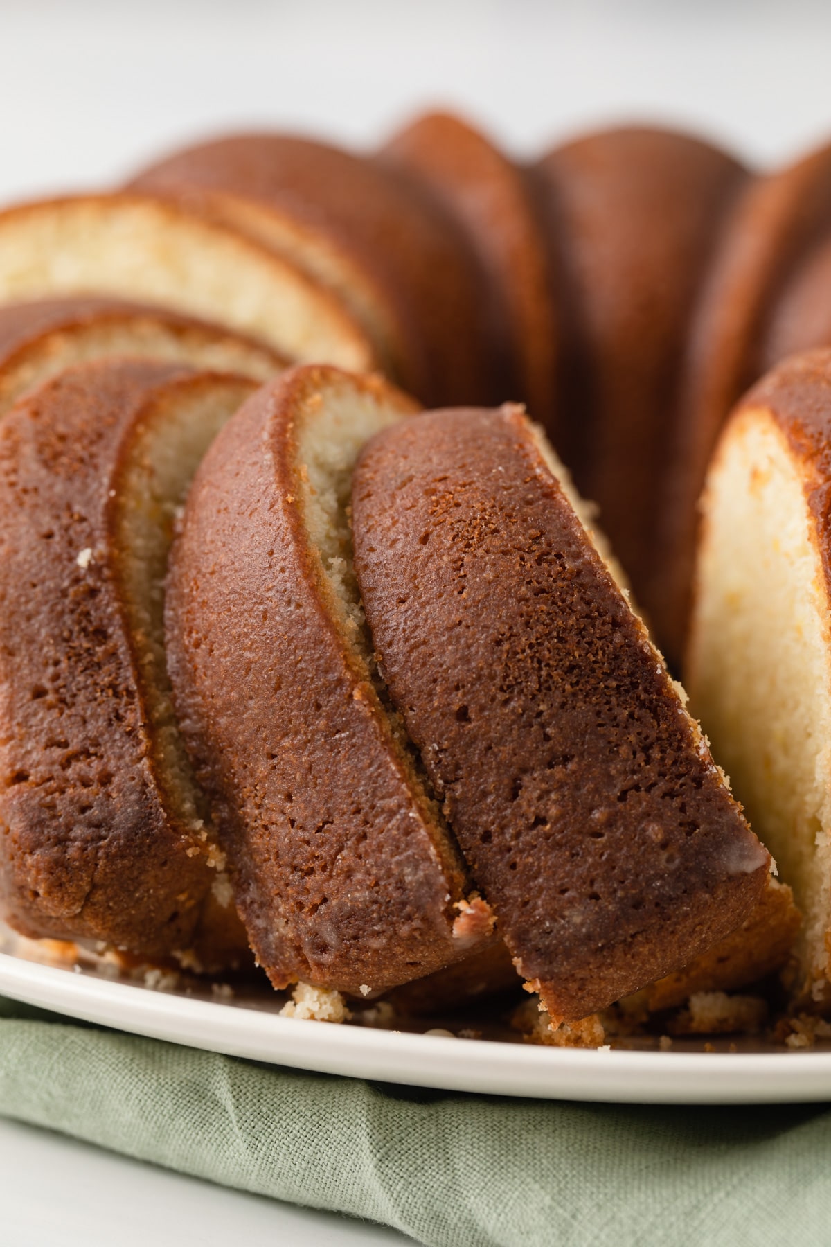 close up of sliced orange pound cake