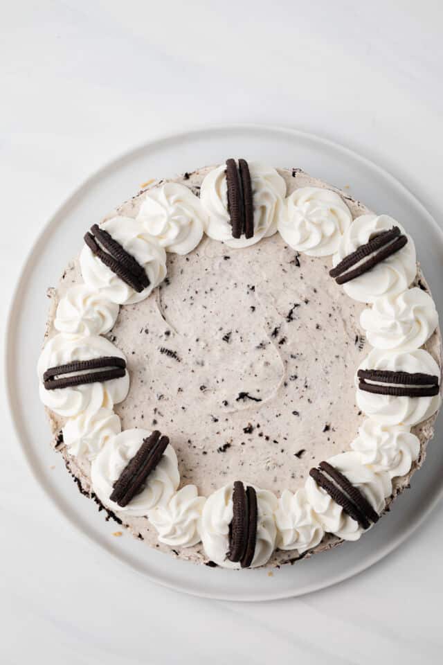 Overhead of no bake Oreo cheesecake on white plate.