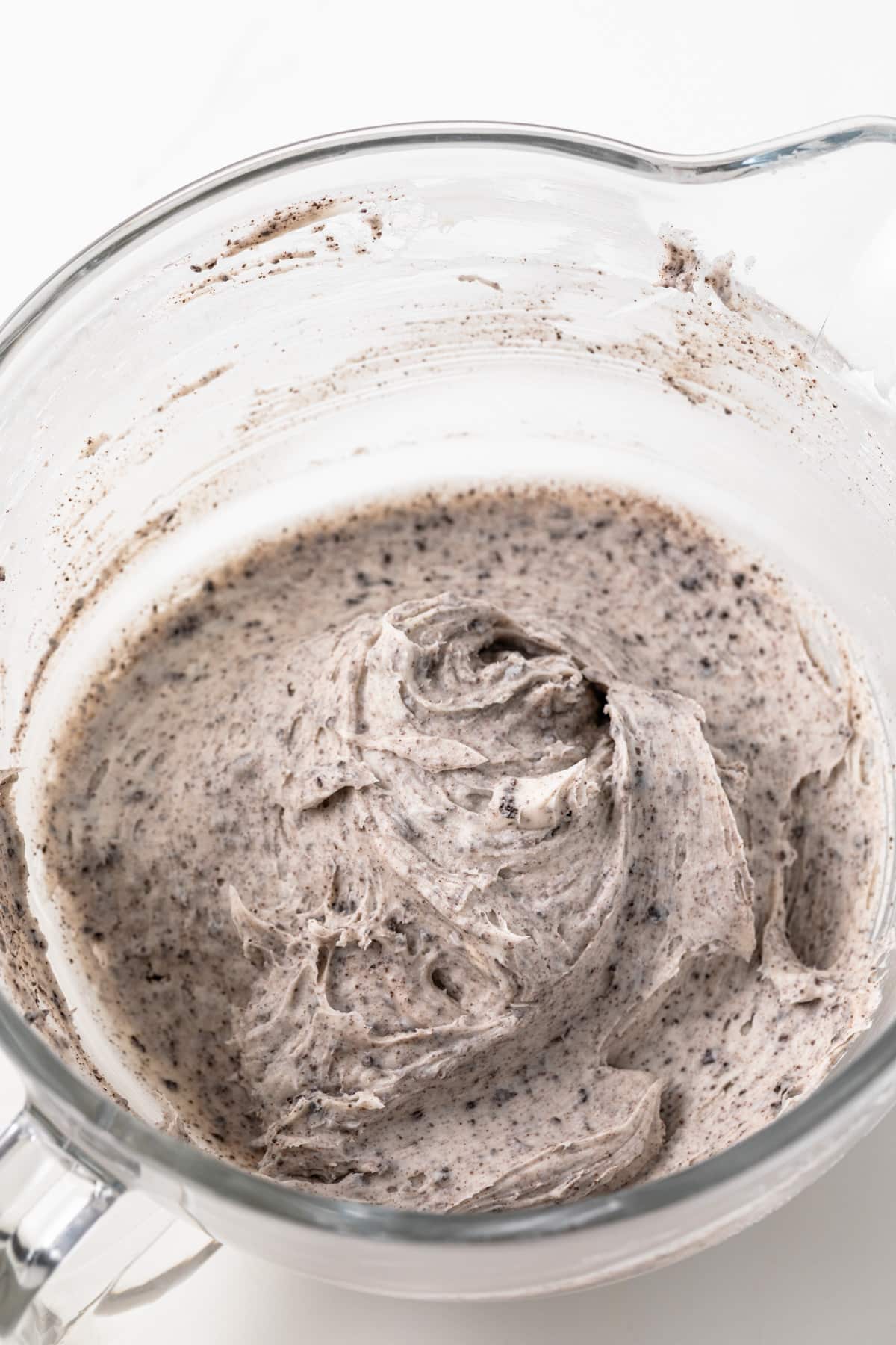 Crushed Oreos mixed into cream cheese frosting.