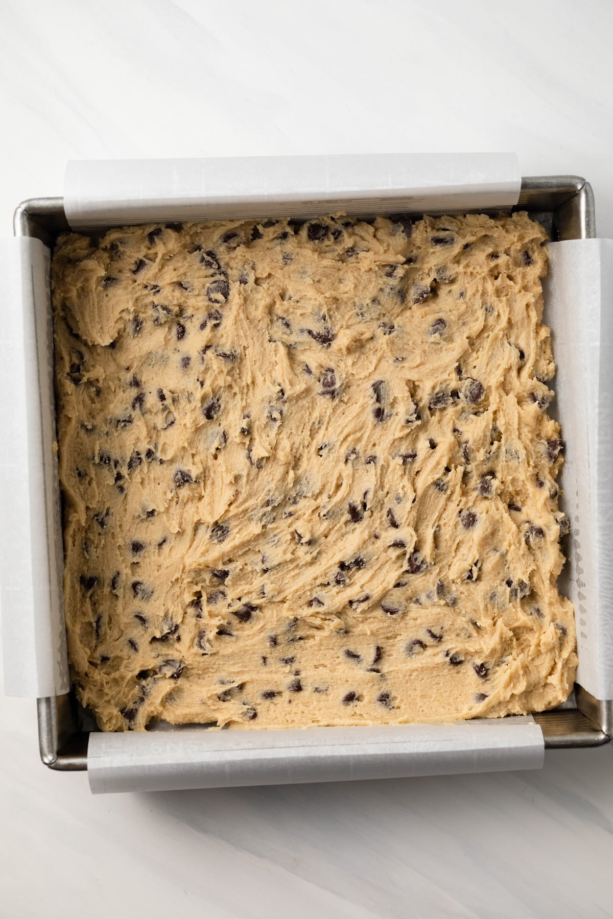 Cookie dough in baking pan.