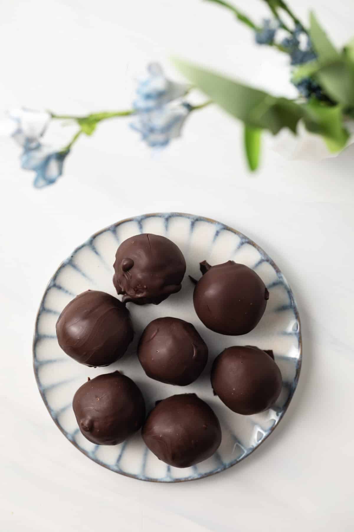 Overhead of peanut butter balls on plate.