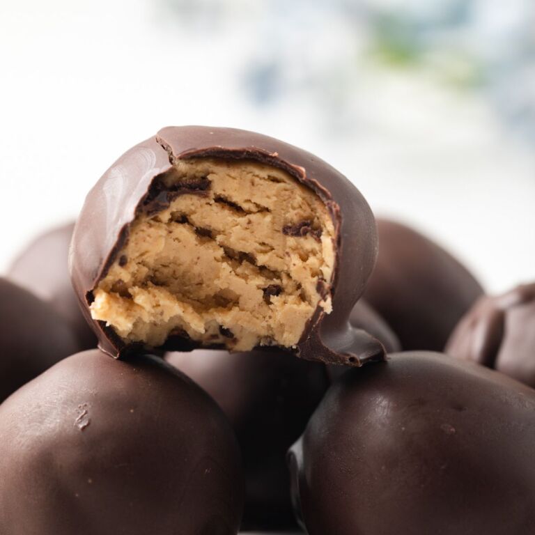 Peanut butter ball with bite taken out.