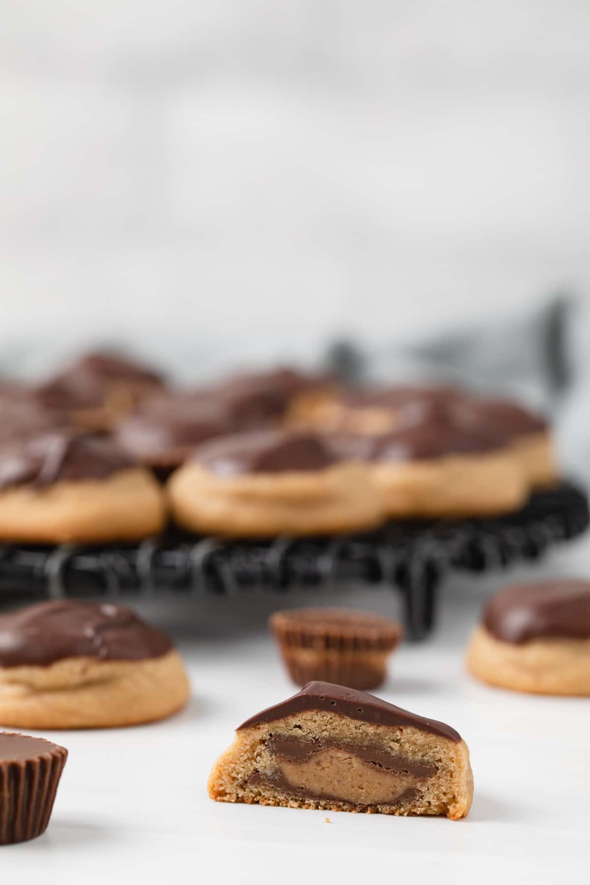 sliced peanut butter cup cookie so the candy inside is visible