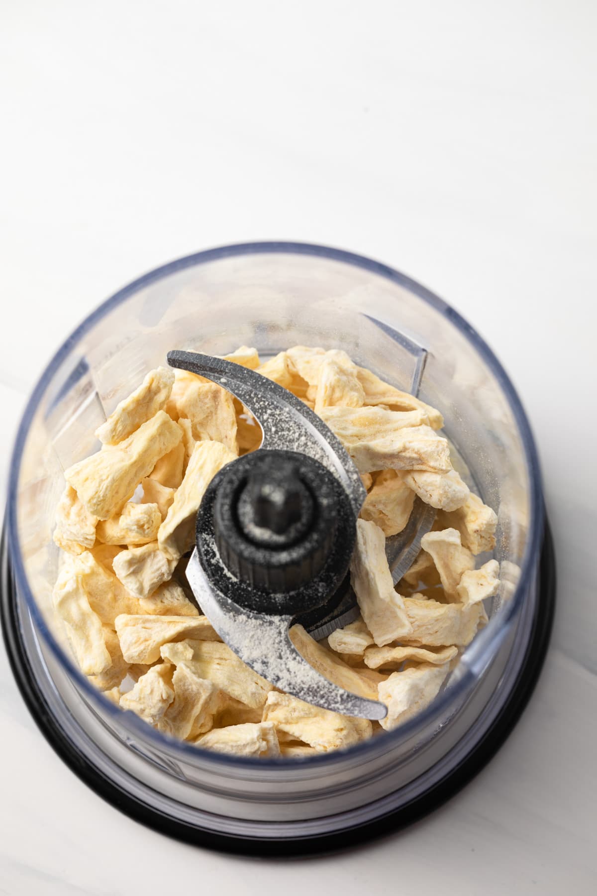 Freeze dried pineapple in a food processor.