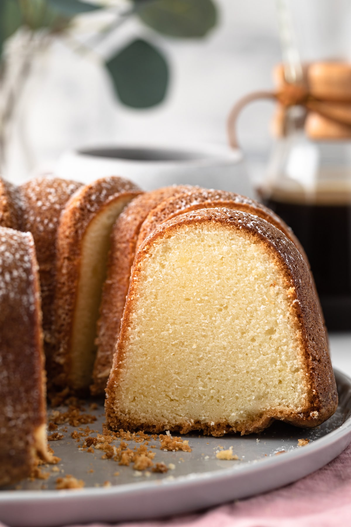 pound cake with slice taken out so the inside crumb is visible