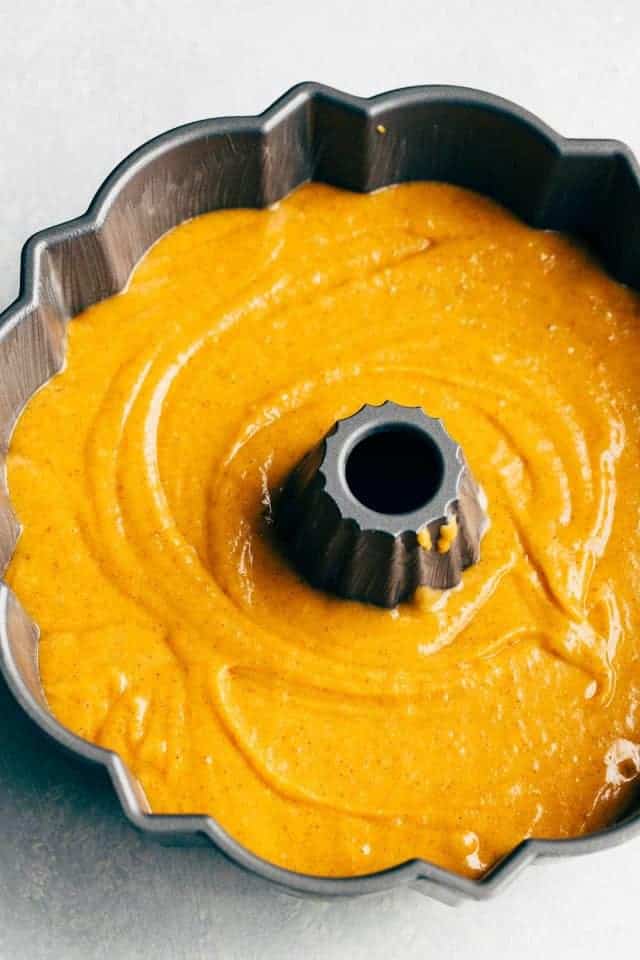 Pumpkin bundt cake batter in a 10 inch bundt pan.