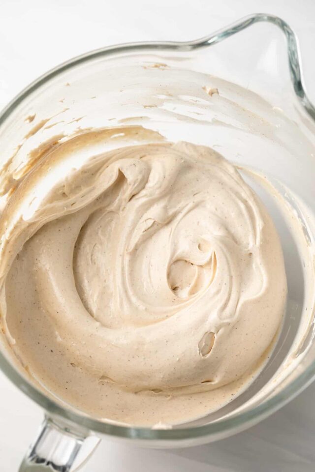 Whipped cream cheese in a mixing bowl