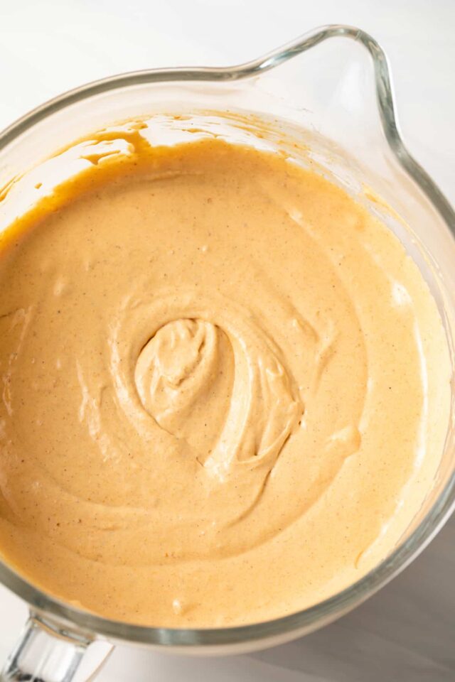 Cheesecake filling mixture in a mixing dish