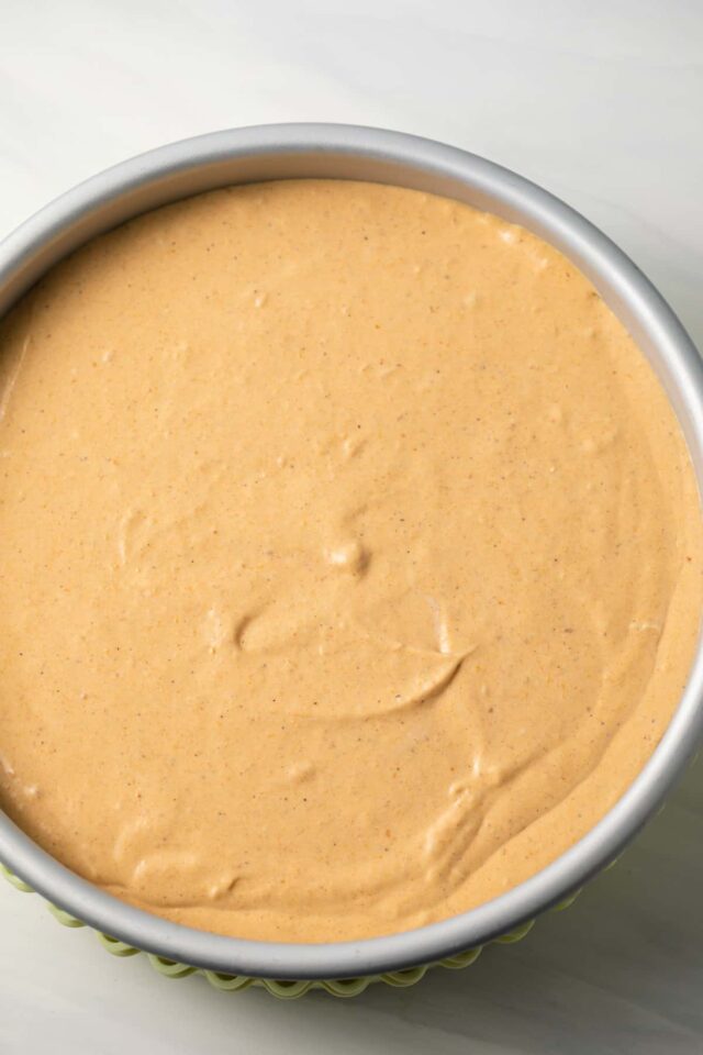 Pumpkin cheesecake filling ready to be baked