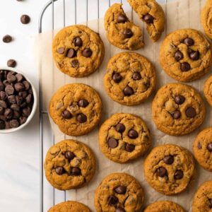 Overhead view of pumpkin chocolate chip cookies on a cooling rack