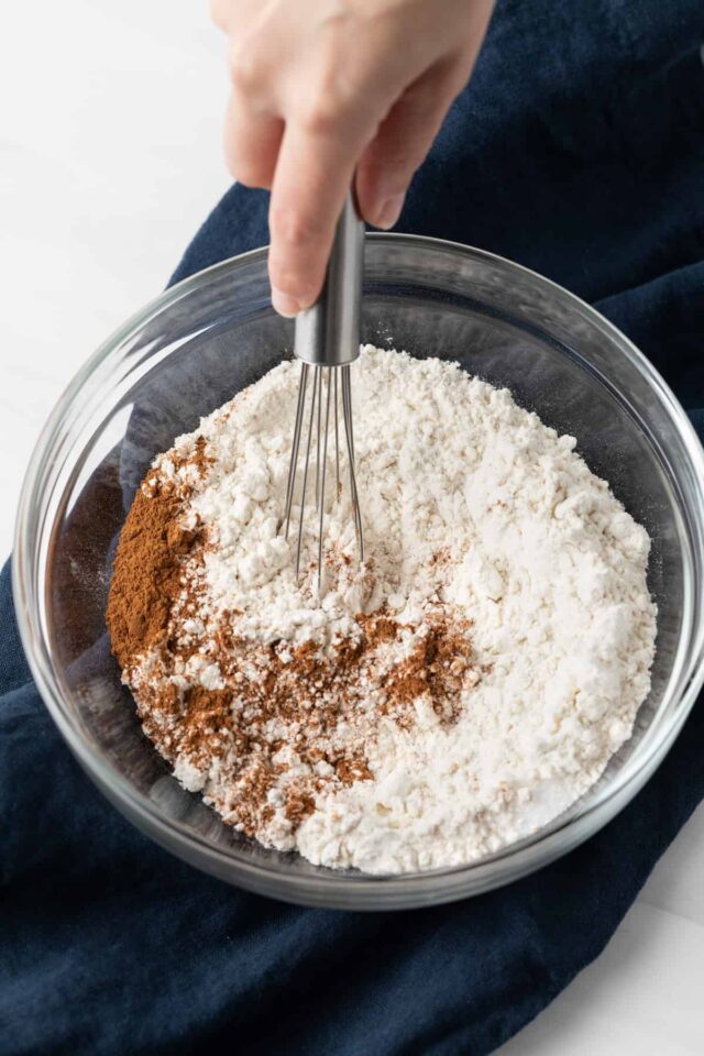 Dry ingredients whisked in glass bowl