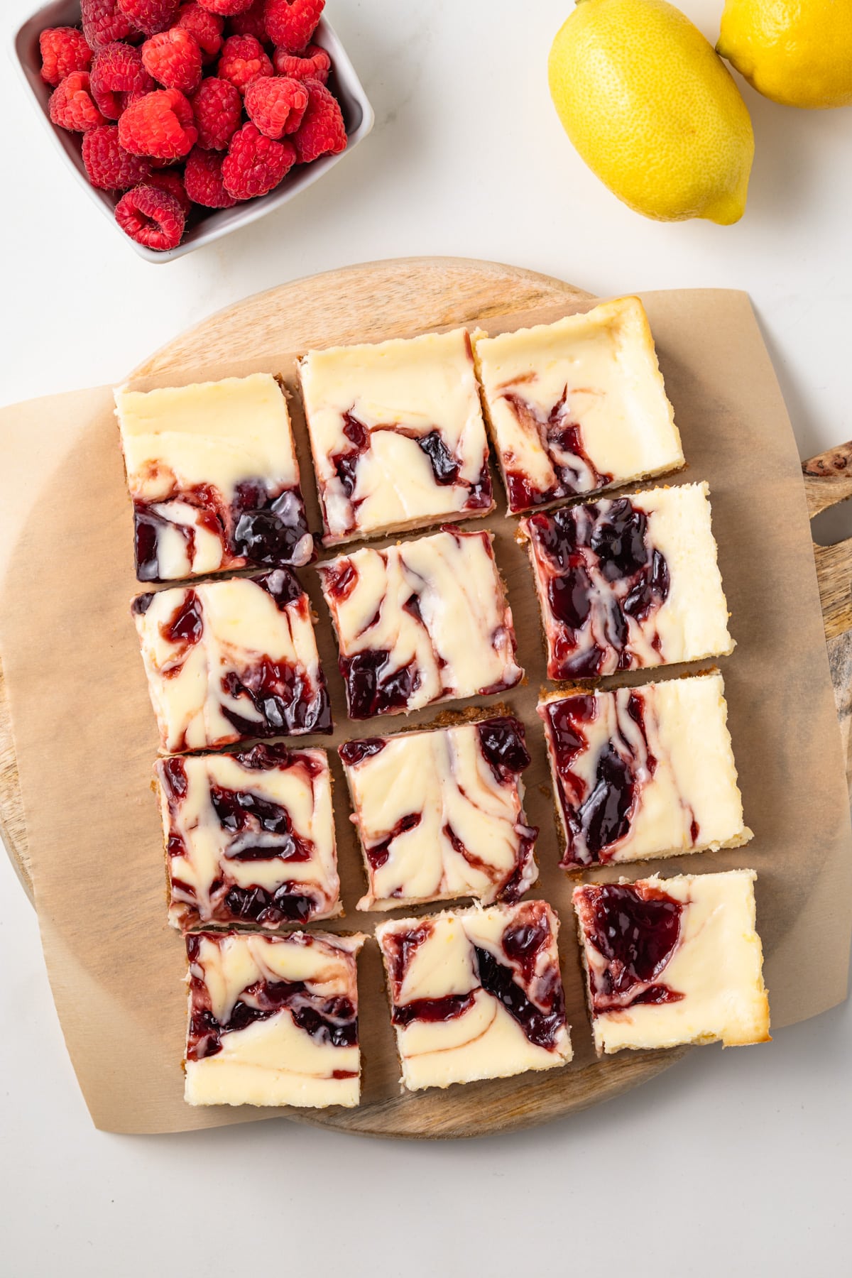 Overhead of raspberry lemon cheesecake bars.