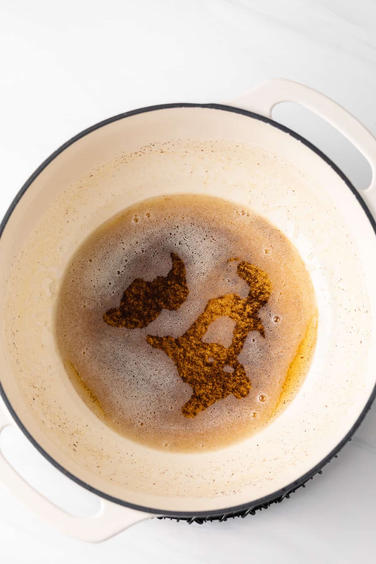 brown butter in cream colored pot
