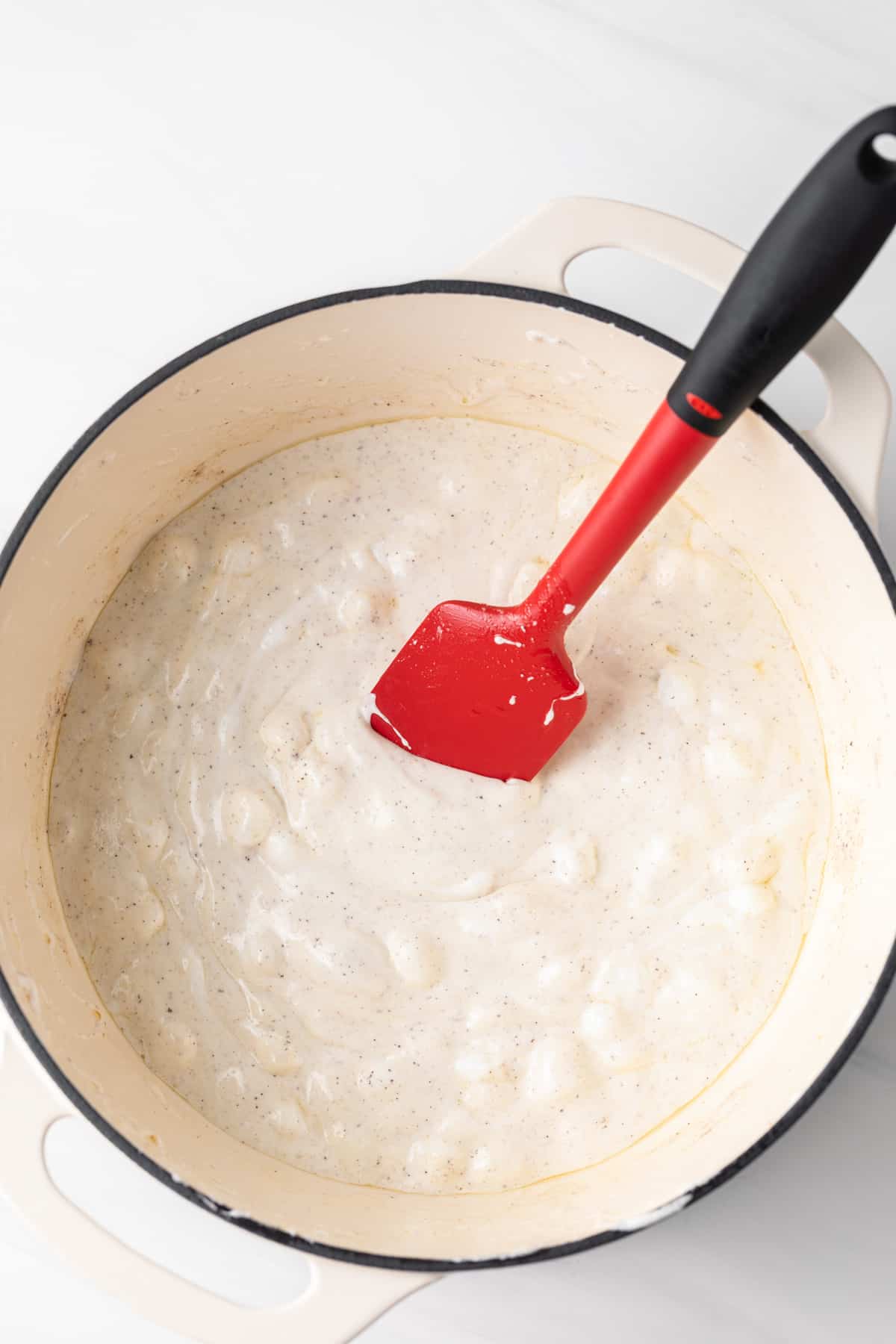 melted marshmallows in cream colored pot