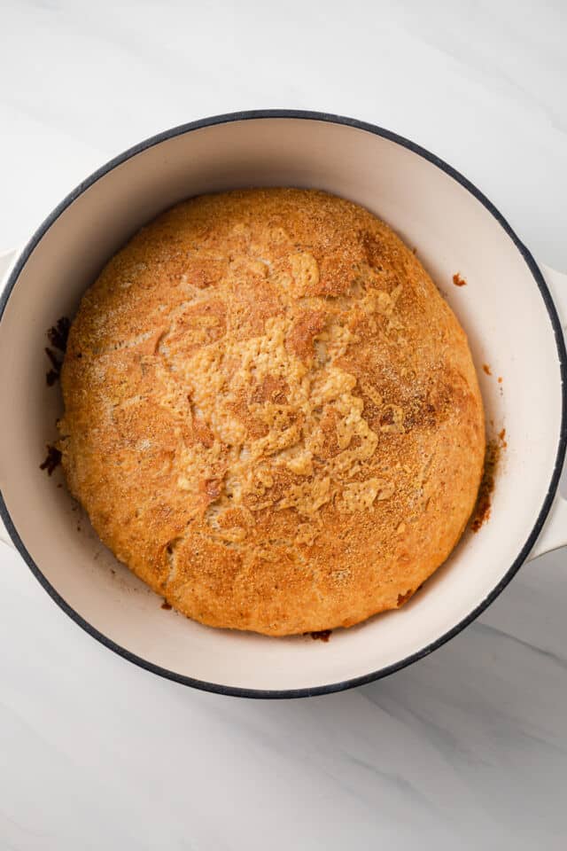 Baked rosemary cheese bread in dutch oven.